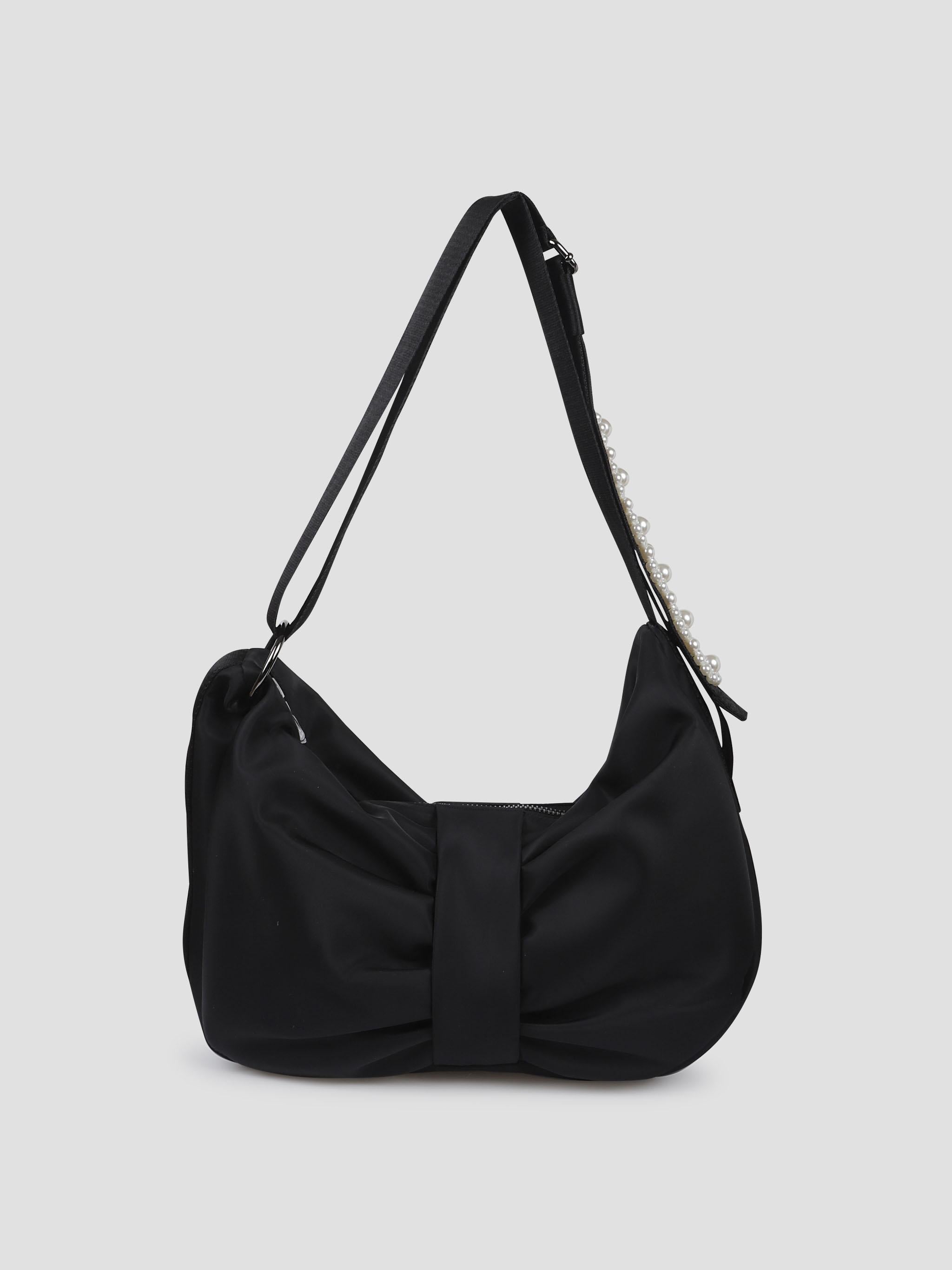 Sling bow bag w/ emb