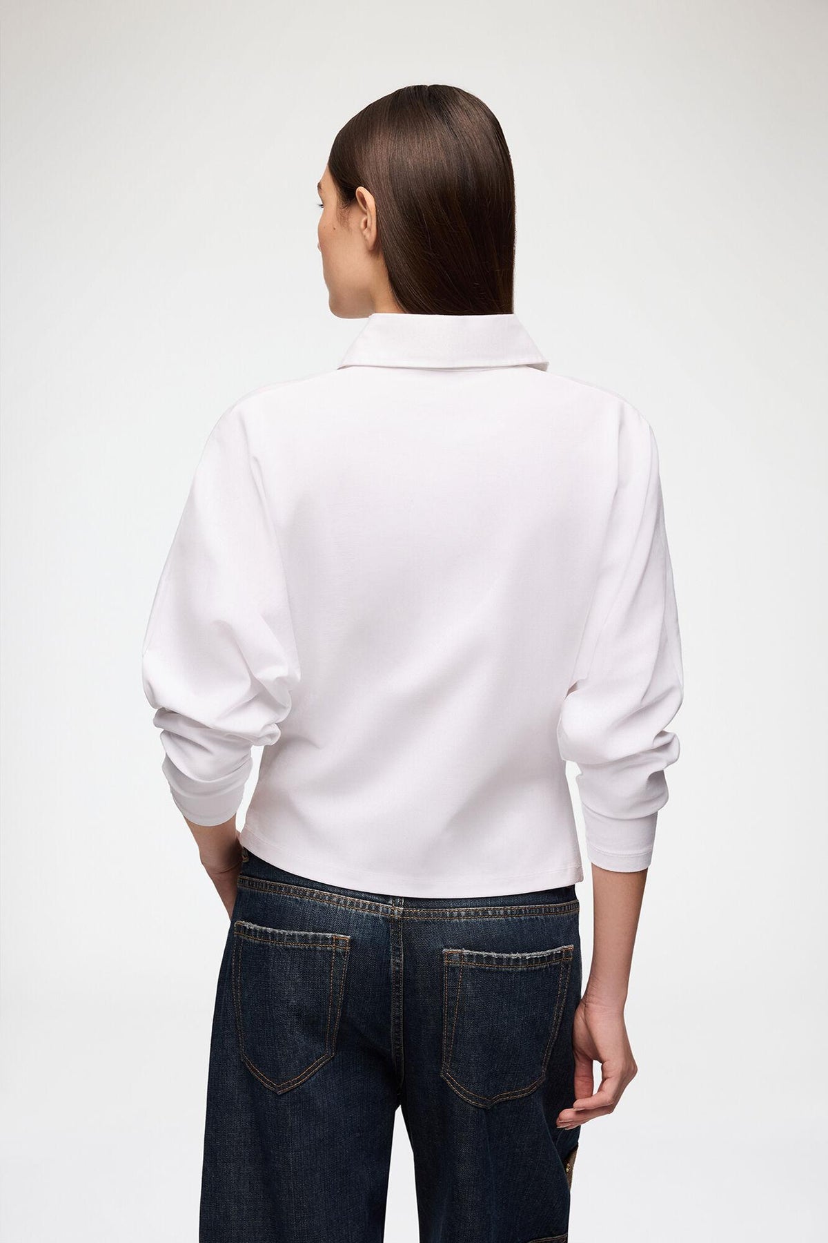 Heavy stretch jersey draped polo
