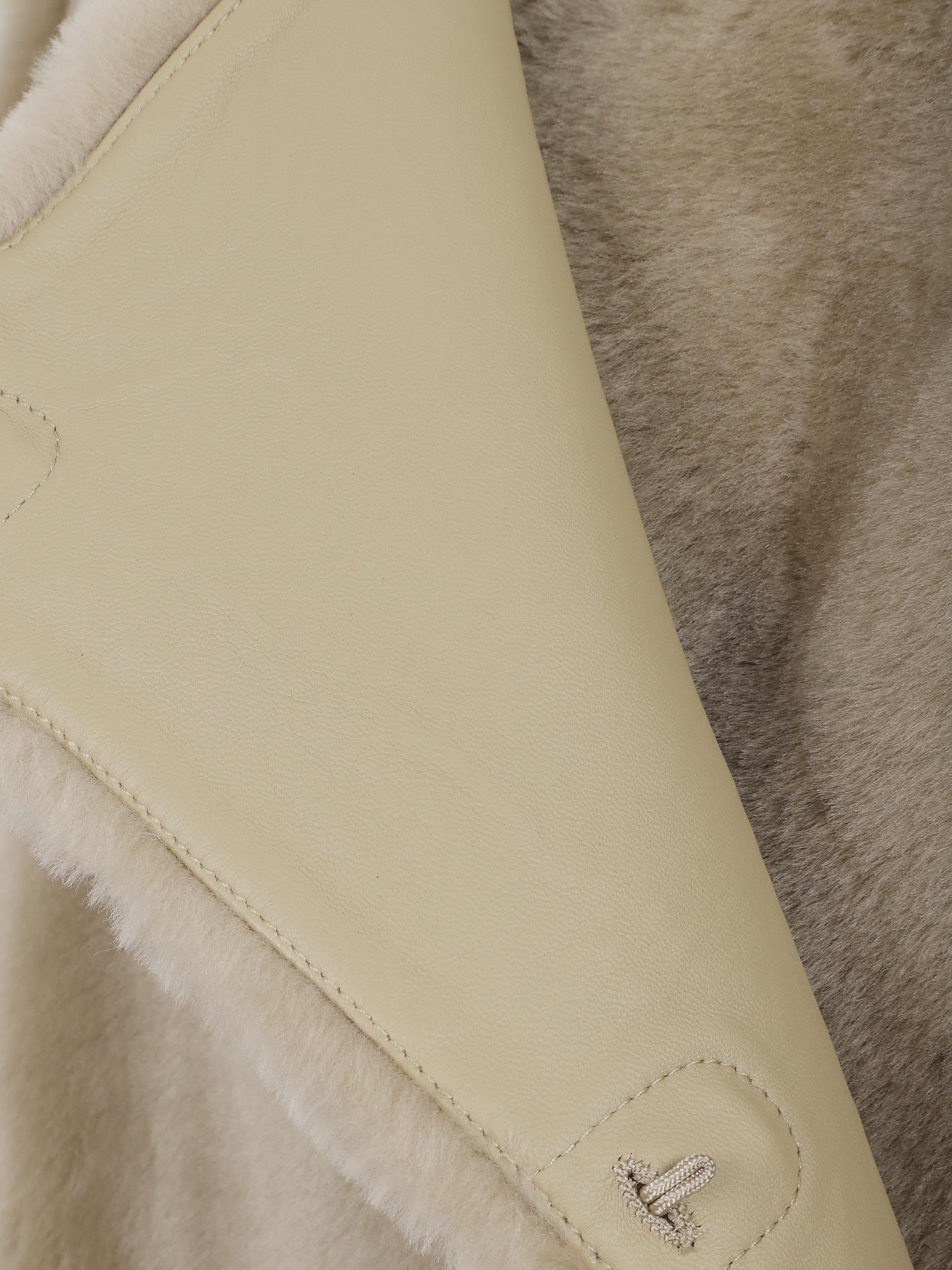 Collarless shearling coat