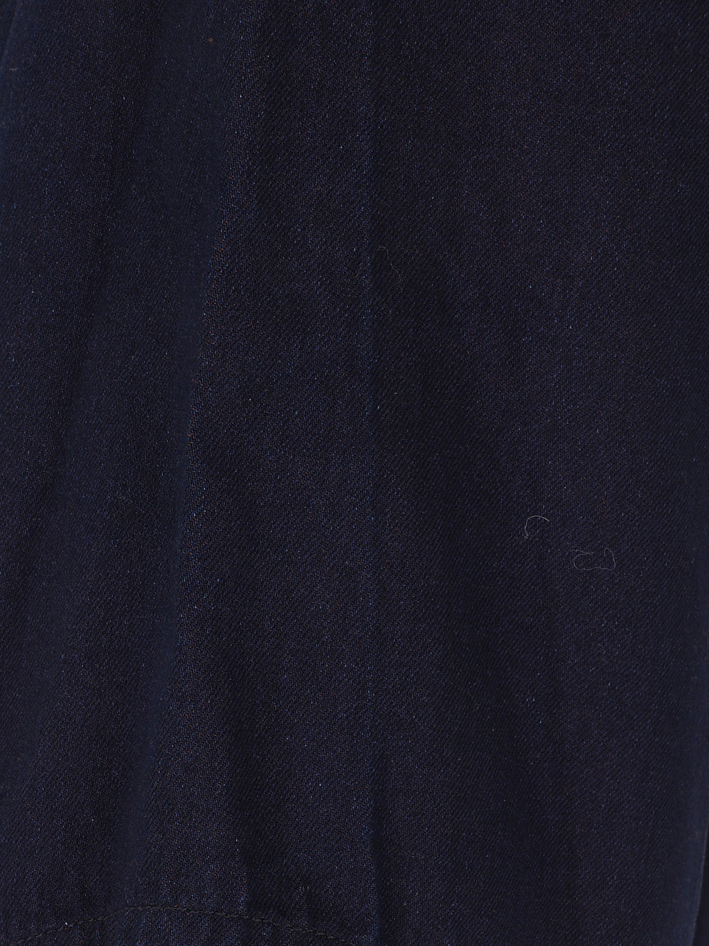 Cropped sculptural jeans